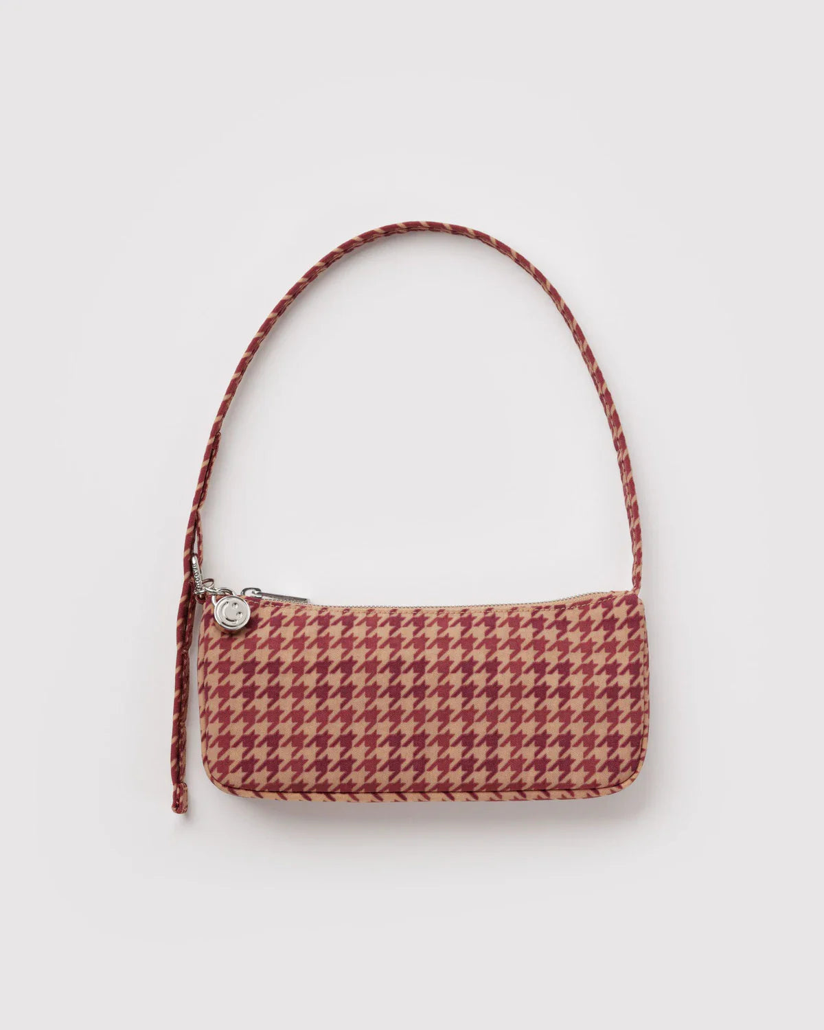 Baggu nylon pochette shoulder bag in tan and burgundy houndstooth pattern with braided strap