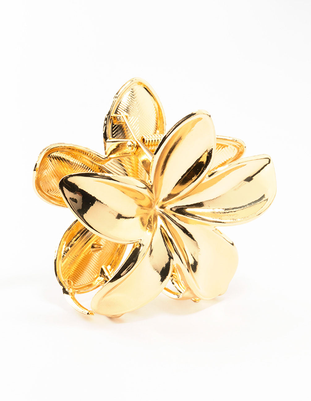 Gold metallic flower-shaped hair claw clip with six petals on white background