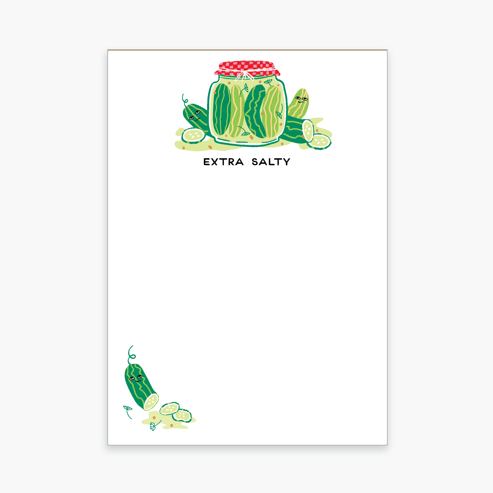 White notepad featuring illustrated pickle jar with pickles and text Extra Salty