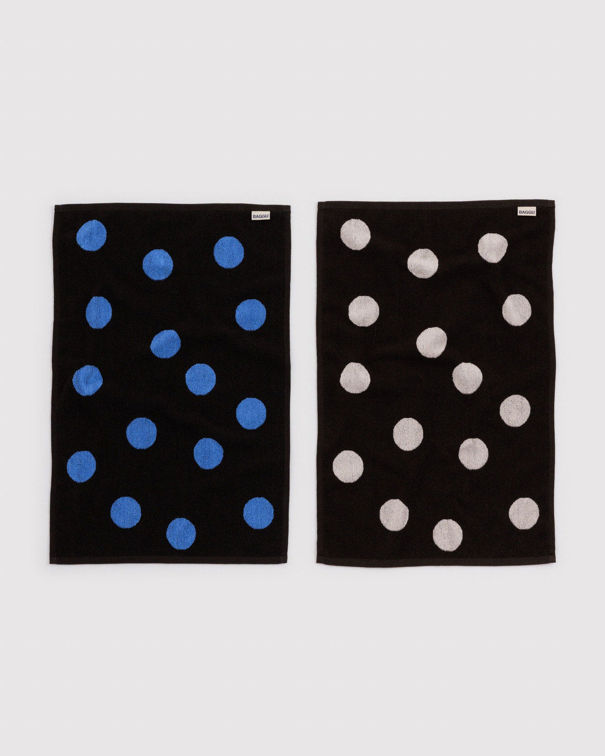 Baggu set of two black hand towels with scattered polka dots in blue and grey