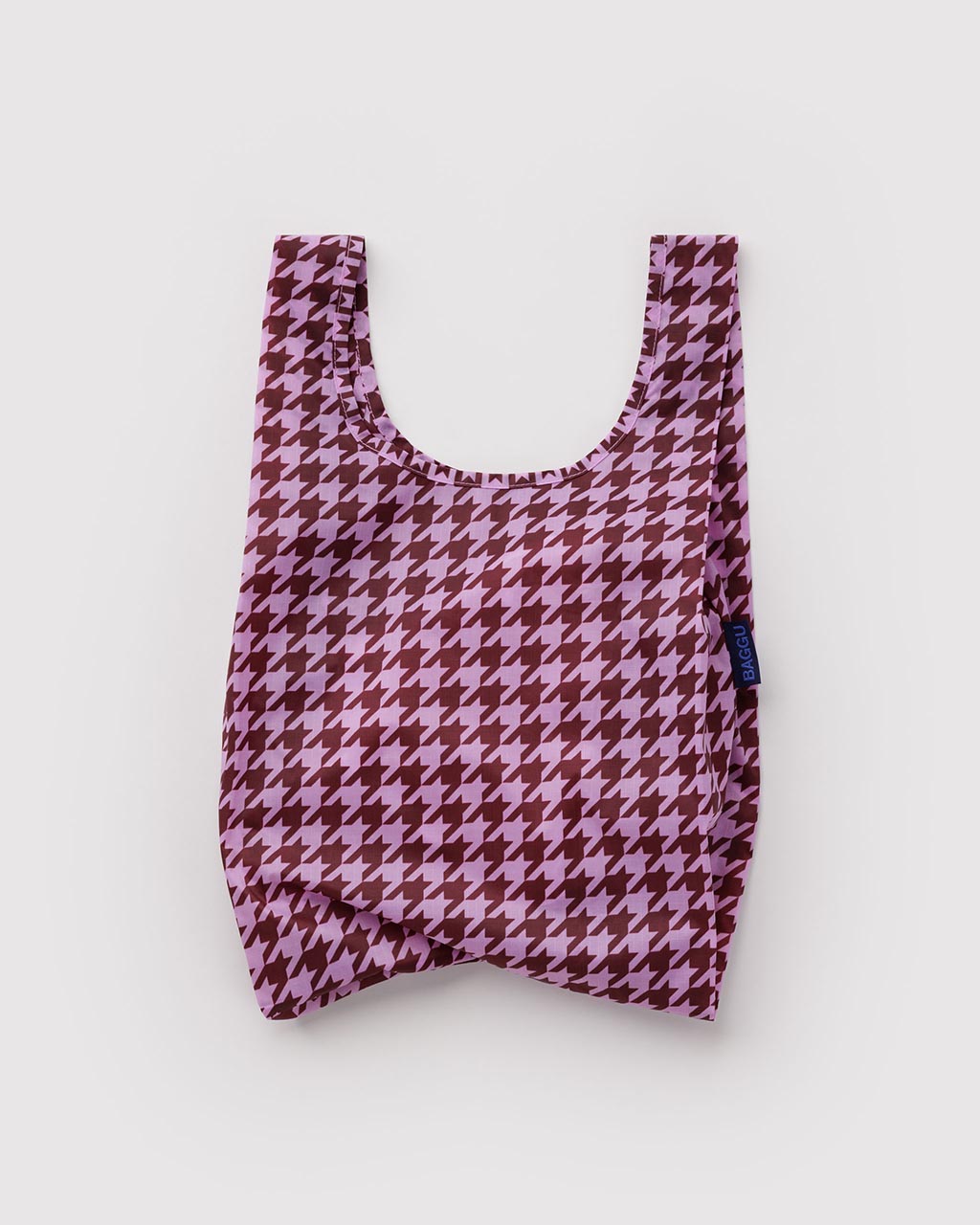 Baby Baggu reusable tote bag in pink and maroon houndstooth pattern on white background