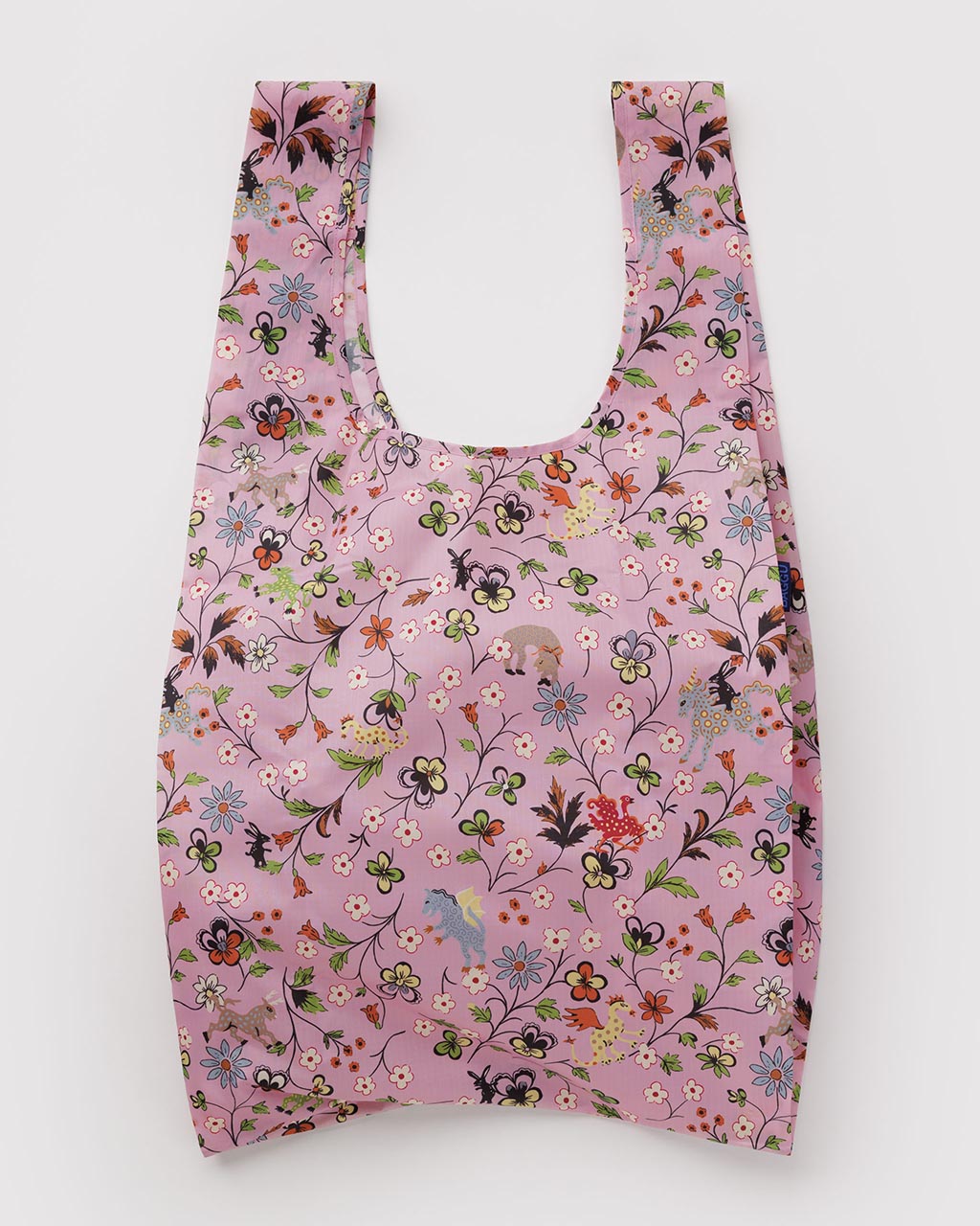 Baggu Big Baggu reusable tote bag in pink with floral and fantasy animal print