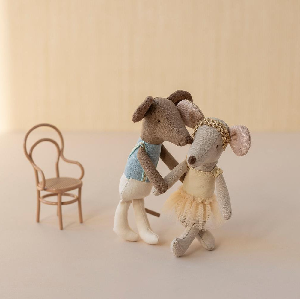 Two Maileg mouse dolls dancing together, one in blue top and white pants, other in yellow tutu