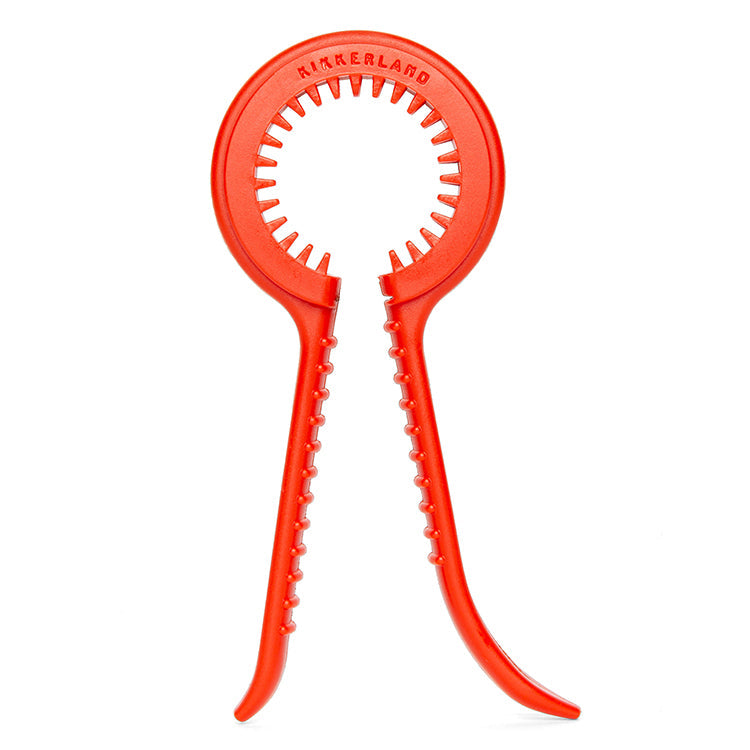 Red Kikkerland Get a Grip jar opener with circular serrated head and two curved handles