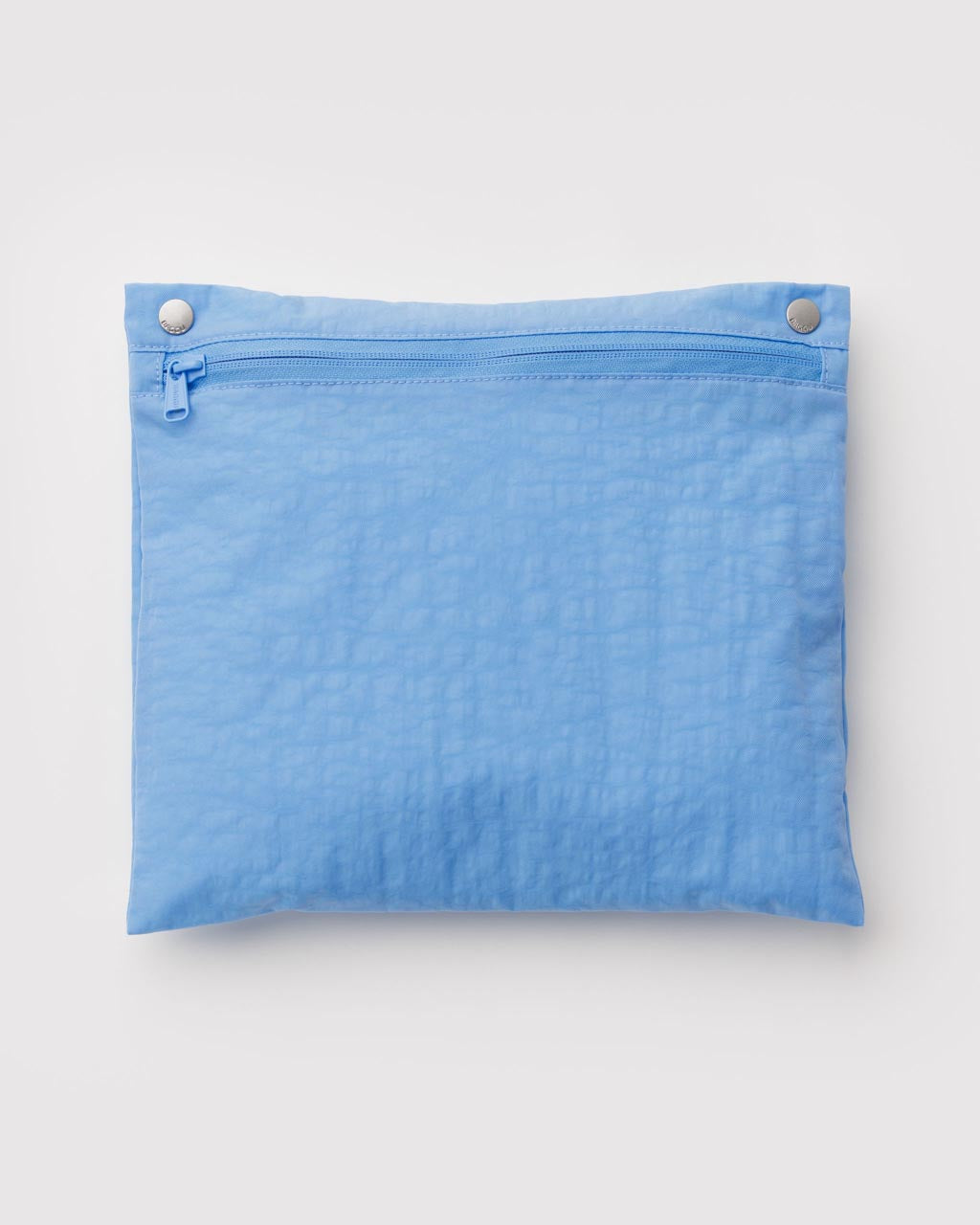Baggu Cloud Carry-on in light blue Piscine with zipper pocket and snap buttons