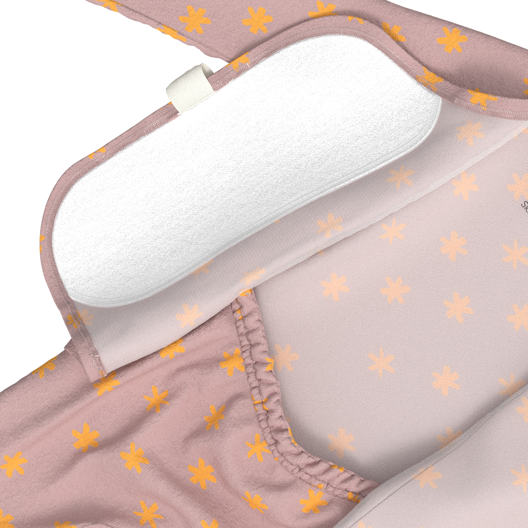 Bonsie Skin to Skin Footie in blush pink Galaxy Gleam print showing fold-down panel with absorbent pad insert