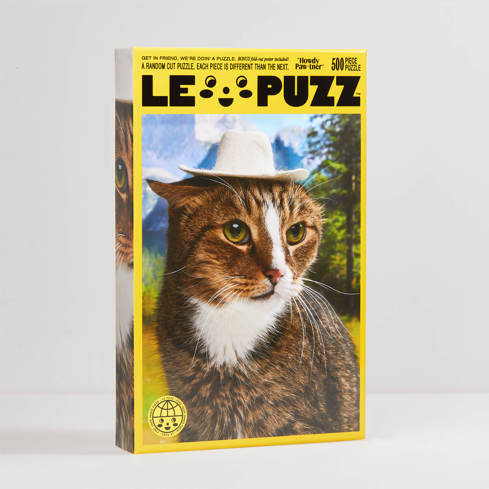 Le Puzz 500-piece jigsaw puzzle box featuring a tabby cat wearing a white cowboy hat