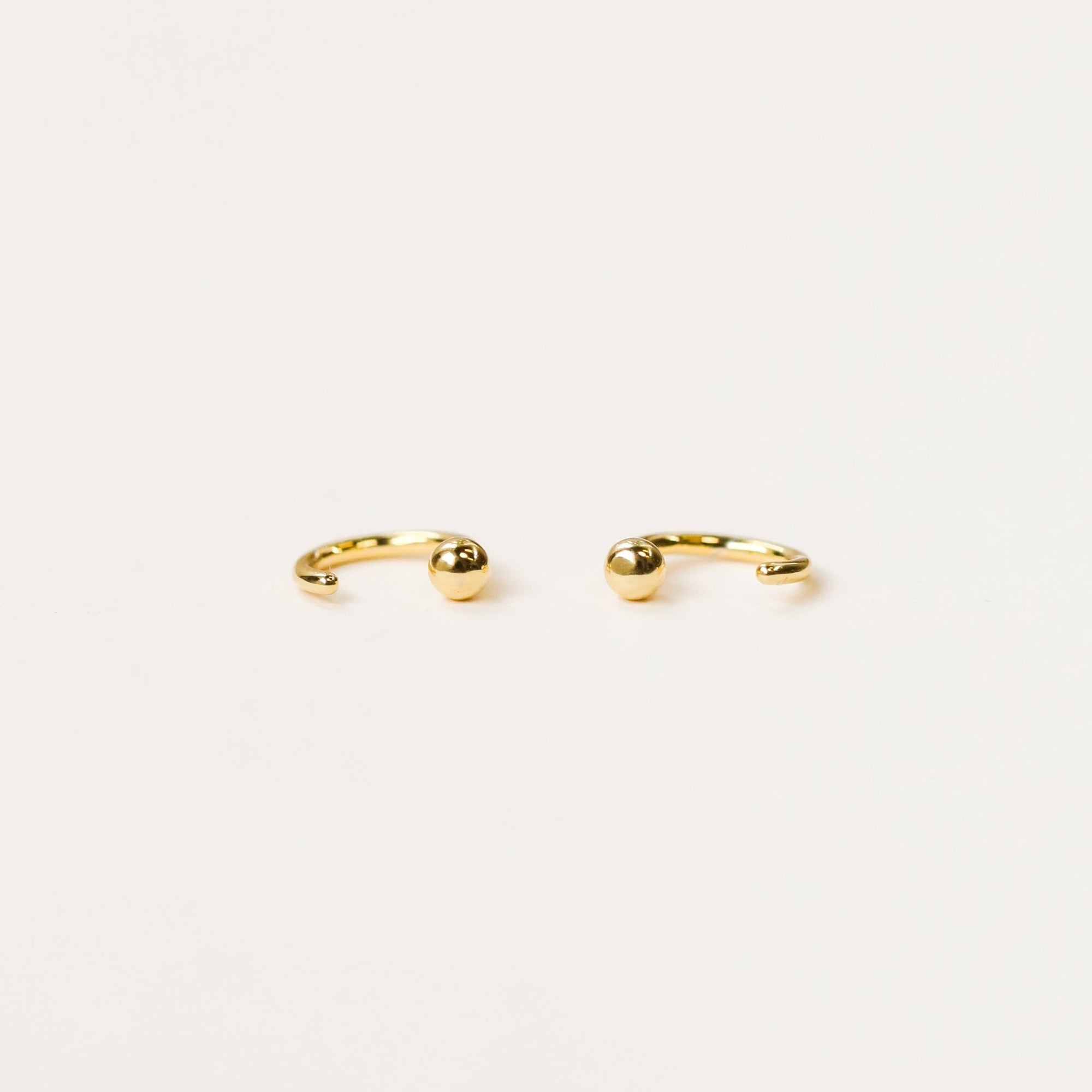 Gold Sphere Huggie Earrings