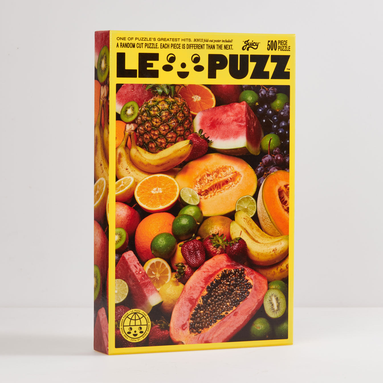 Le Puzz 'Juicy' 500-piece random cut puzzle box featuring vibrant tropical fruit photography