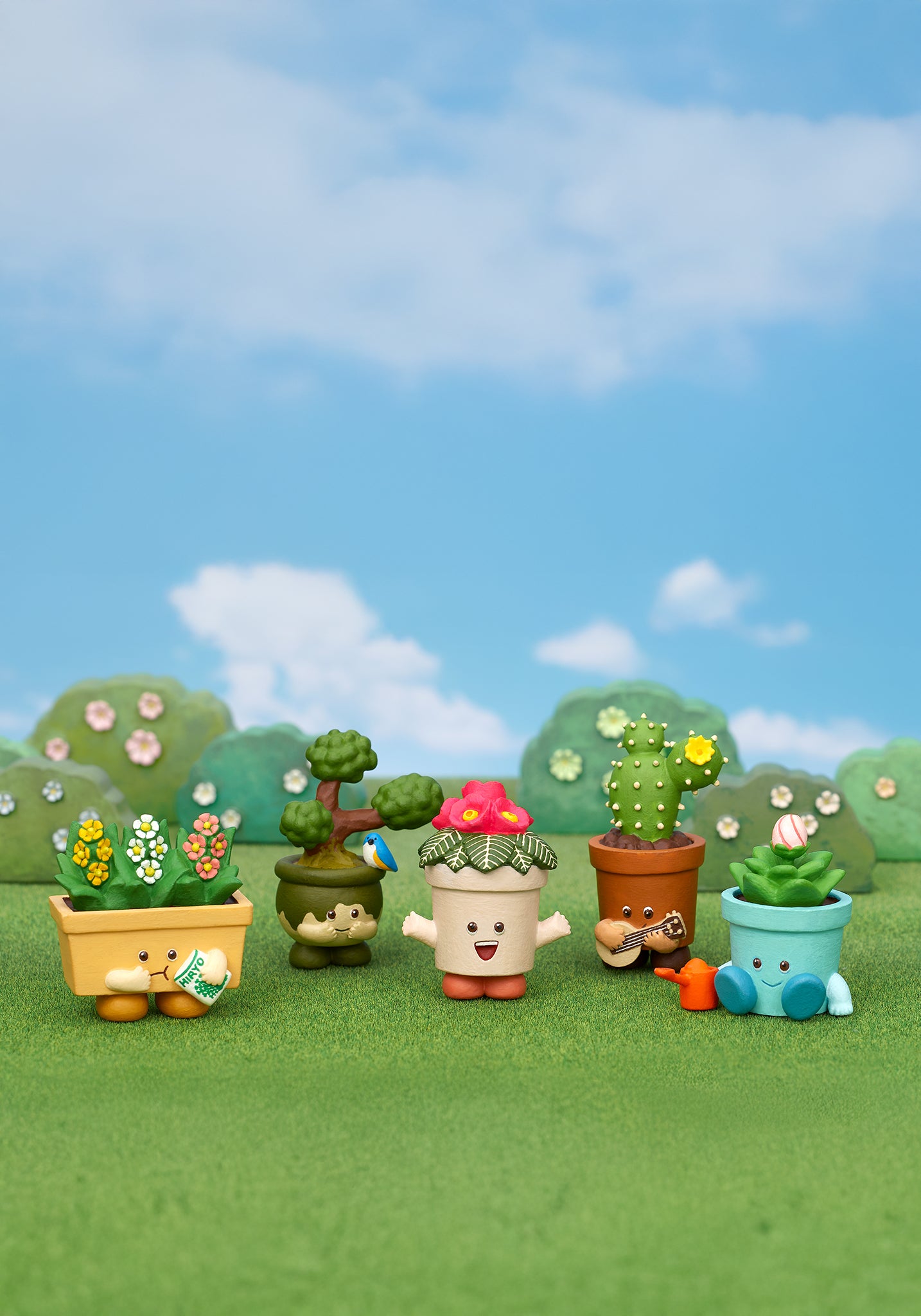 Five cute anthropomorphic potted plant blind box figurines displayed on green grass background with blue sky