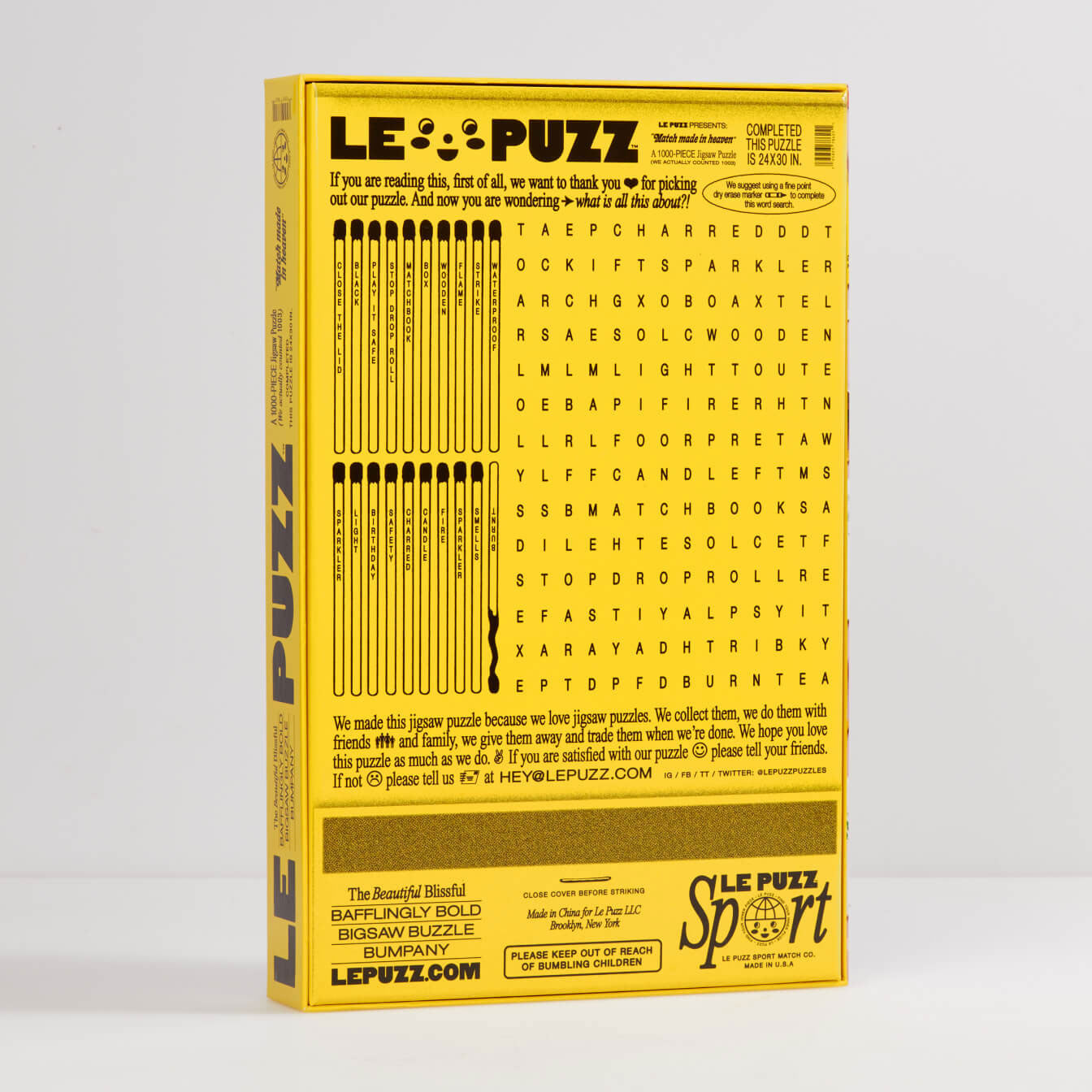 Back of Le Puzz Match Made in Heaven 1000-piece jigsaw puzzle box in bright yellow
