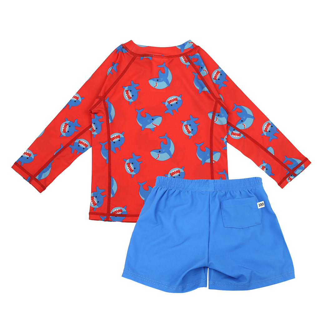 Zoocchini Sherman Shark red rashguard top with blue shark print and matching blue swim shorts, back view