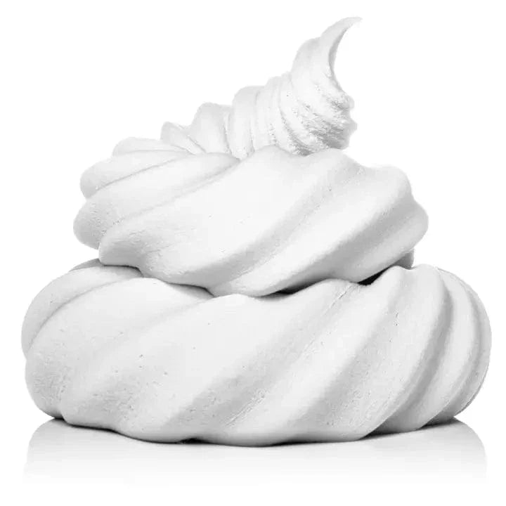 White air dry clay shaped into a swirled mound displayed on a white background