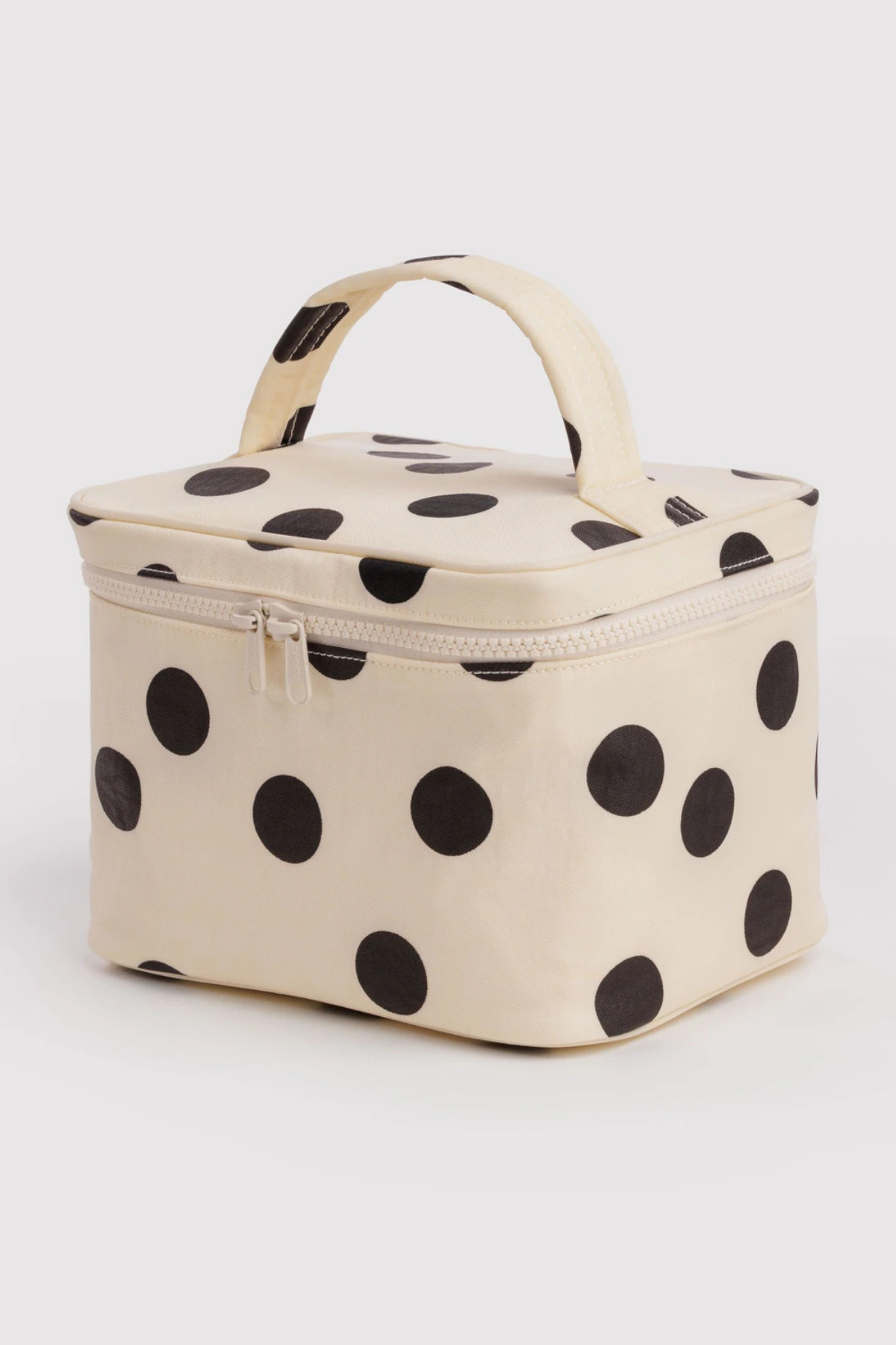 Baggu large cosmetic case in cream with bold black polka dots and top handle