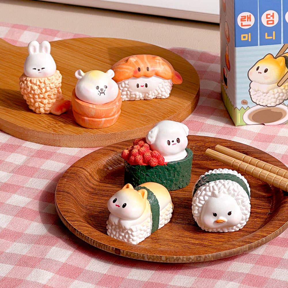 Cute animal-shaped sushi miniature figures including salmon nigiri, temaki rolls, and other kawaii sushi characters on woo...
