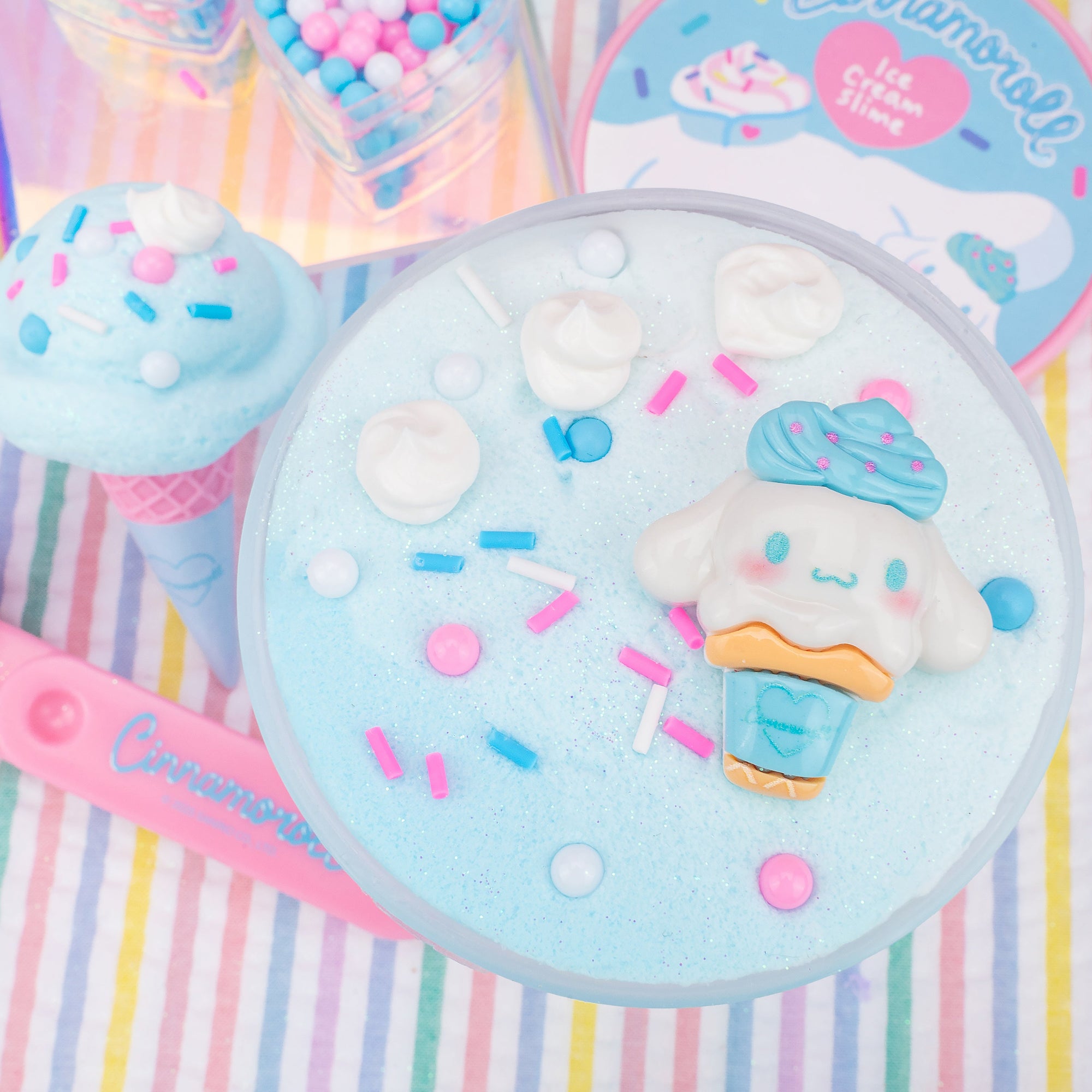 Cinnamoroll Ice Cream Slime Kit with blue glitter slime, sprinkles, and character charm