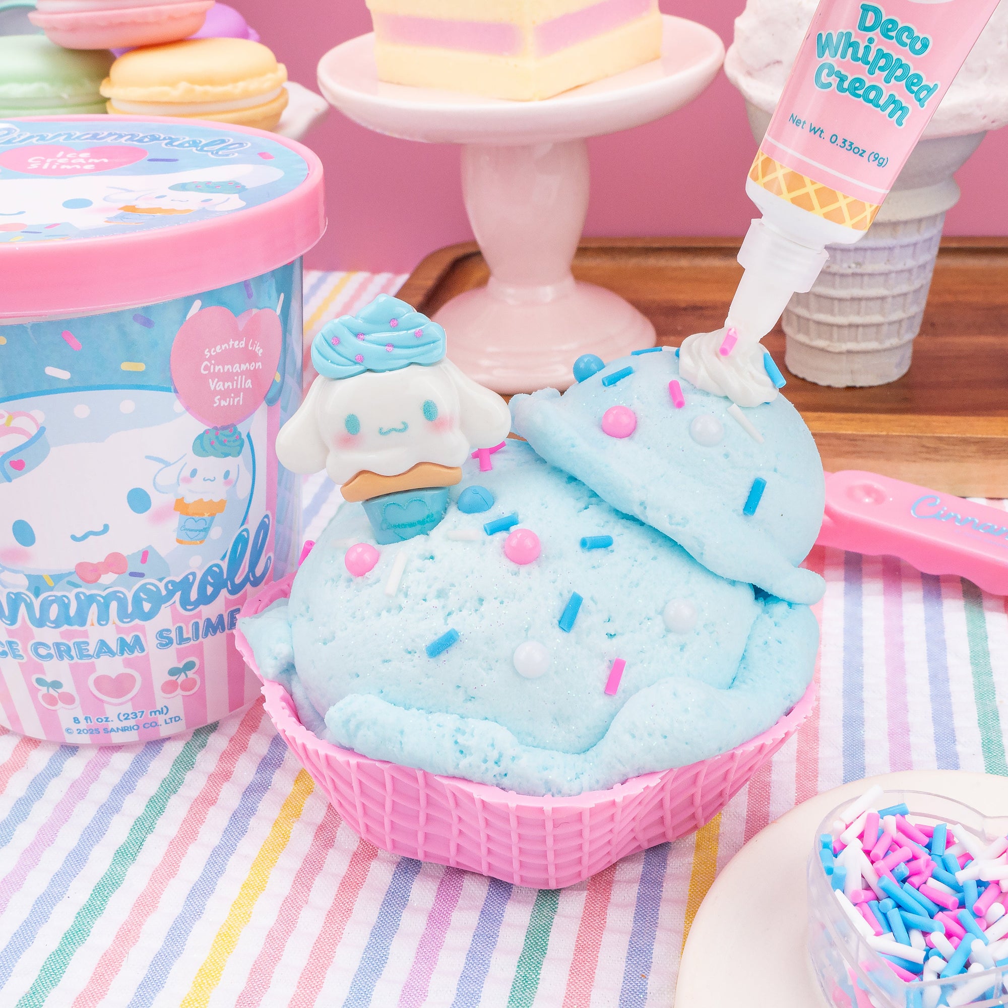 Cinnamoroll ice cream slime kit displayed in pink bowl with blue slime, sprinkles, and deco whipped cream tube
