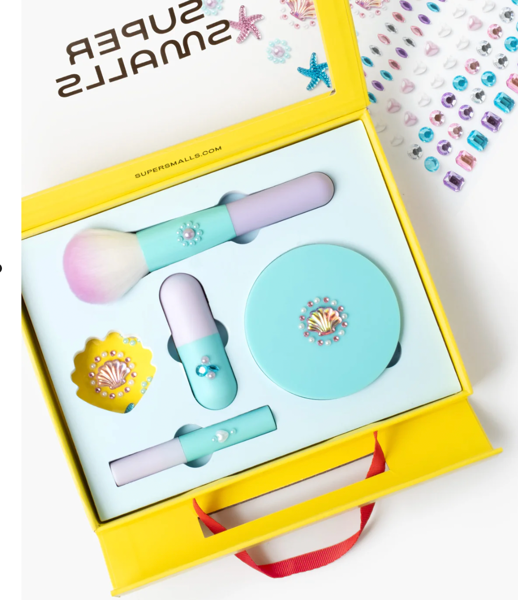 Set of colorful makeup items in a yellow box with 'Super Swirls' branding.